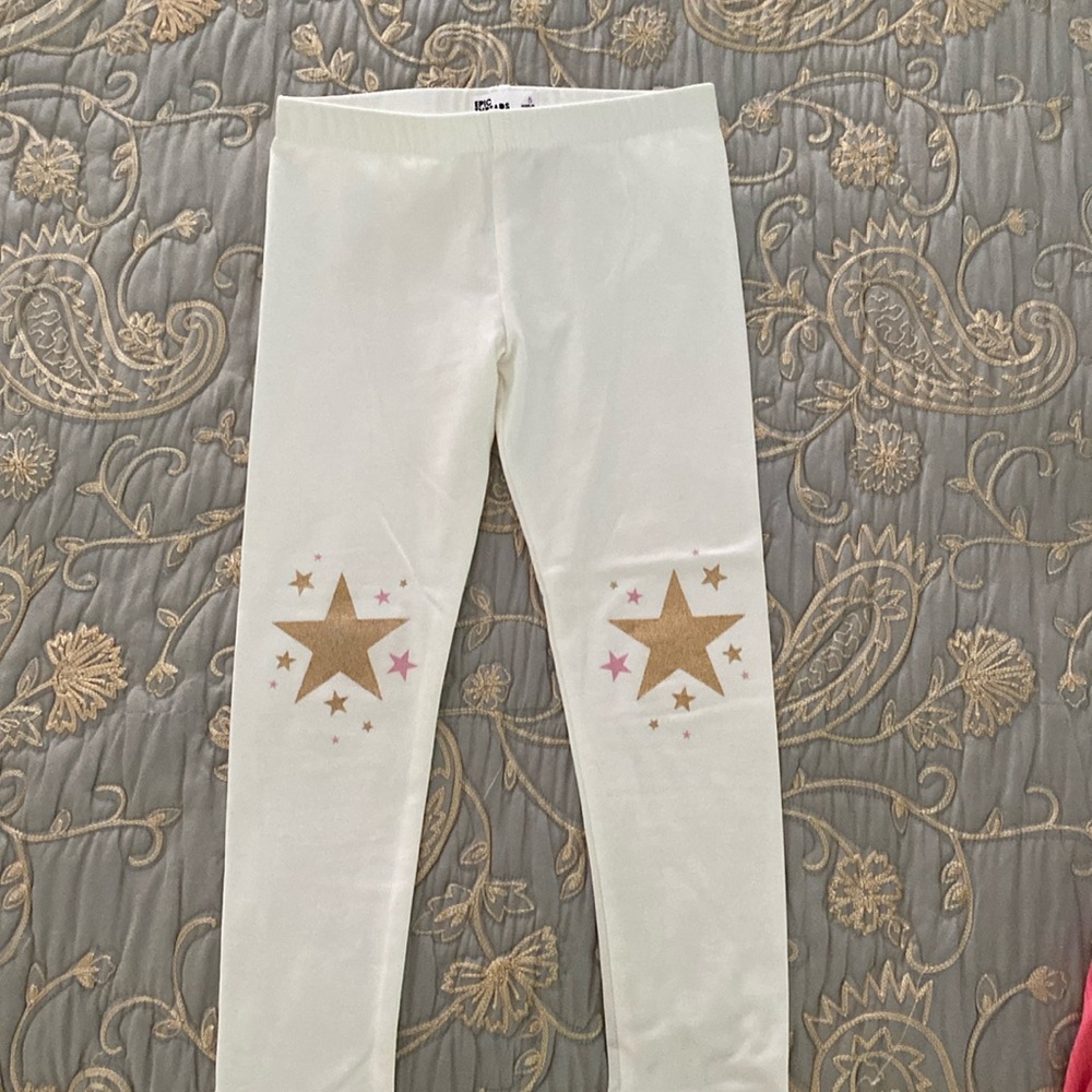 Girls leggings.  Size 5. Like new, worn only once
